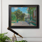 Impressionist residential landscape at Argenteuil by Claude Monet in an ornate black frame with gilded inner detail displayed in a light-toned interior setting.