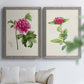 Set of two gray barnwood framed canvas prints depicting peonies thistles leafy stems and archival cream paper arranged across two complementary compositions above a sofa in a bright living space.