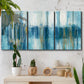 Three-panel canvas wall art featuring layered abstract earth tones, displayed in a boho-chic entryway above a console table.