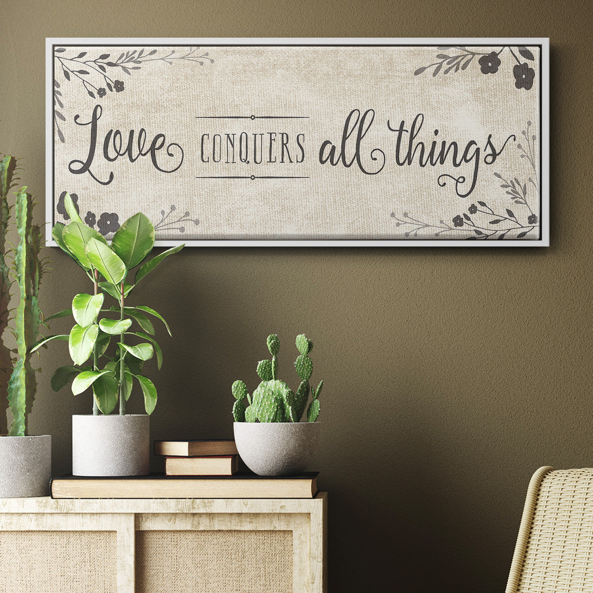 Love Conquers - Floater Framed Canvas Print