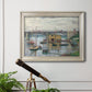 Impressionist river bridge scene on an overcast day by Claude Monet in an ornate champagne frame displayed in a light-toned interior setting.