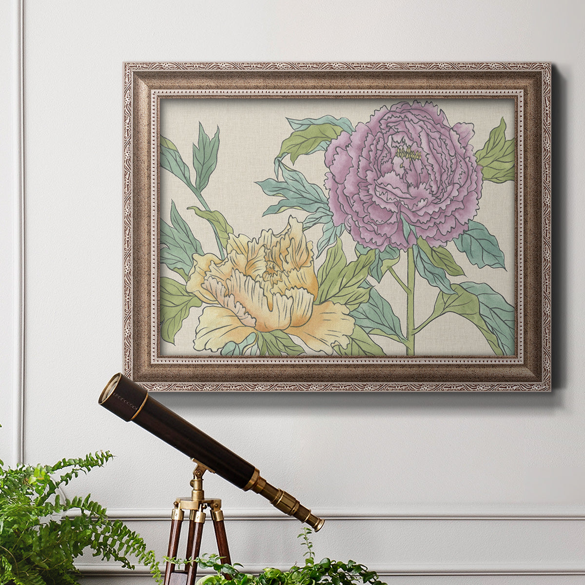 Contemporary peony flower illustration in an ornate traditional silver frame displayed in a light-toned interior setting.