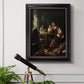Classical portrait of a soldier smoking a pipe by Frans van Mieris the Elder in an ornate black frame with gilded inner detail displayed in a light-toned interior setting.
