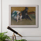 Impressionist portrait of a seated woman by Edgar Degas in an ornate weathered white frame displayed in a light-toned interior setting.