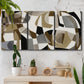 Three-panel canvas wall art featuring overlapping mid century geometric shapes, displayed in a boho-chic entryway above a console table.