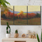 Three-panel canvas wall art featuring autumn landscape changing foliage, displayed in a boho-chic entryway above a console table.