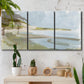 Three-panel canvas wall art featuring coastal cove with calm water, displayed in a boho-chic entryway above a console table.