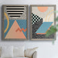 Set of two gray barnwood framed canvas prints depicting checkerboards stripes squiggles peach blue black and mint shapes arranged across two complementary compositions above a sofa in a bright living space.