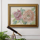 Modern peony floral drawing in an ornate traditional gold frame displayed in a light-toned interior setting.