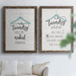 Set of two walnut barnwood framed canvas prints depicting hand-lettered phrases, socks hangers and laundry symbols on linen texture arranged across two complementary compositions above a sofa in a bright living space.