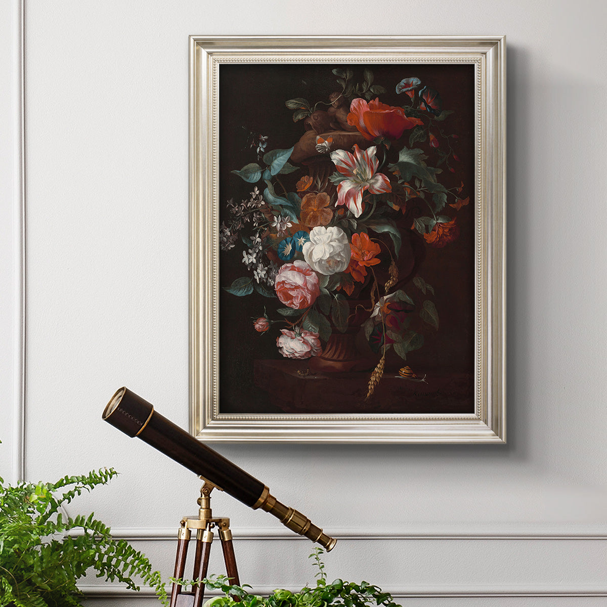 Classical floral still life painting by Jan van Huysum in an ornate champagne frame displayed in a light-toned interior setting.