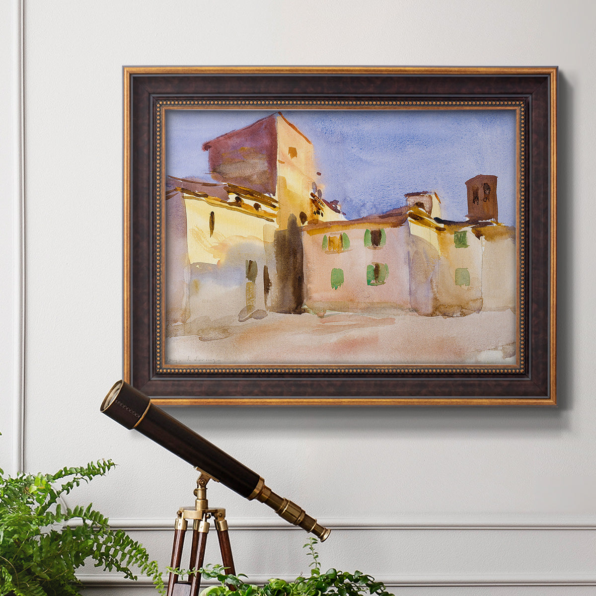 Impressionist Italian village scene by John Singer Sargent in an ornate bronzed mahogany wood frame displayed in a light-toned interior setting.