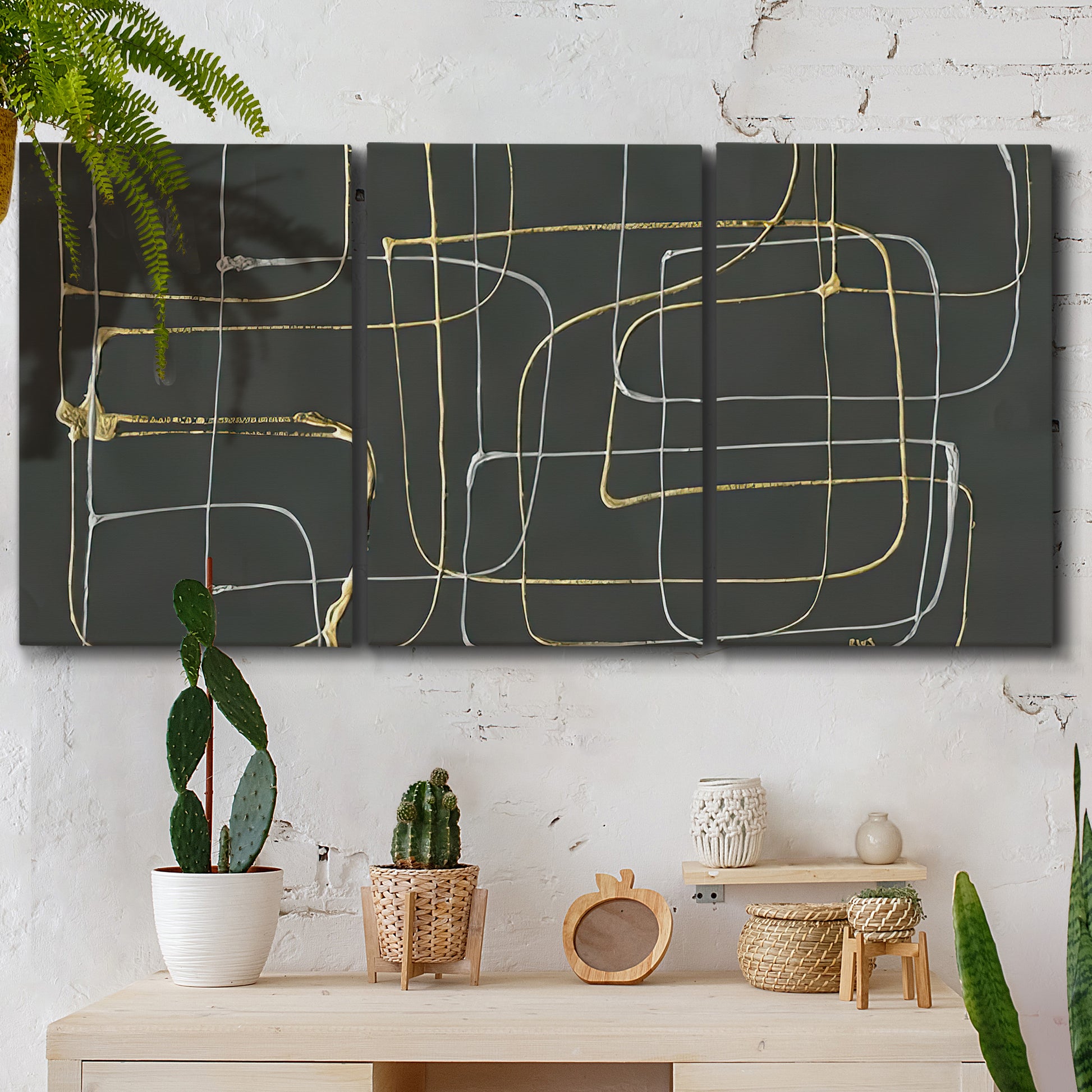 Three-panel canvas wall art featuring linear abstract conduit pattern, displayed in a boho-chic entryway above a console table.