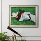 Impressionist outdoor portrait of two girls by John Singer Sargent in an ornate champagne frame displayed in a light-toned interior setting.