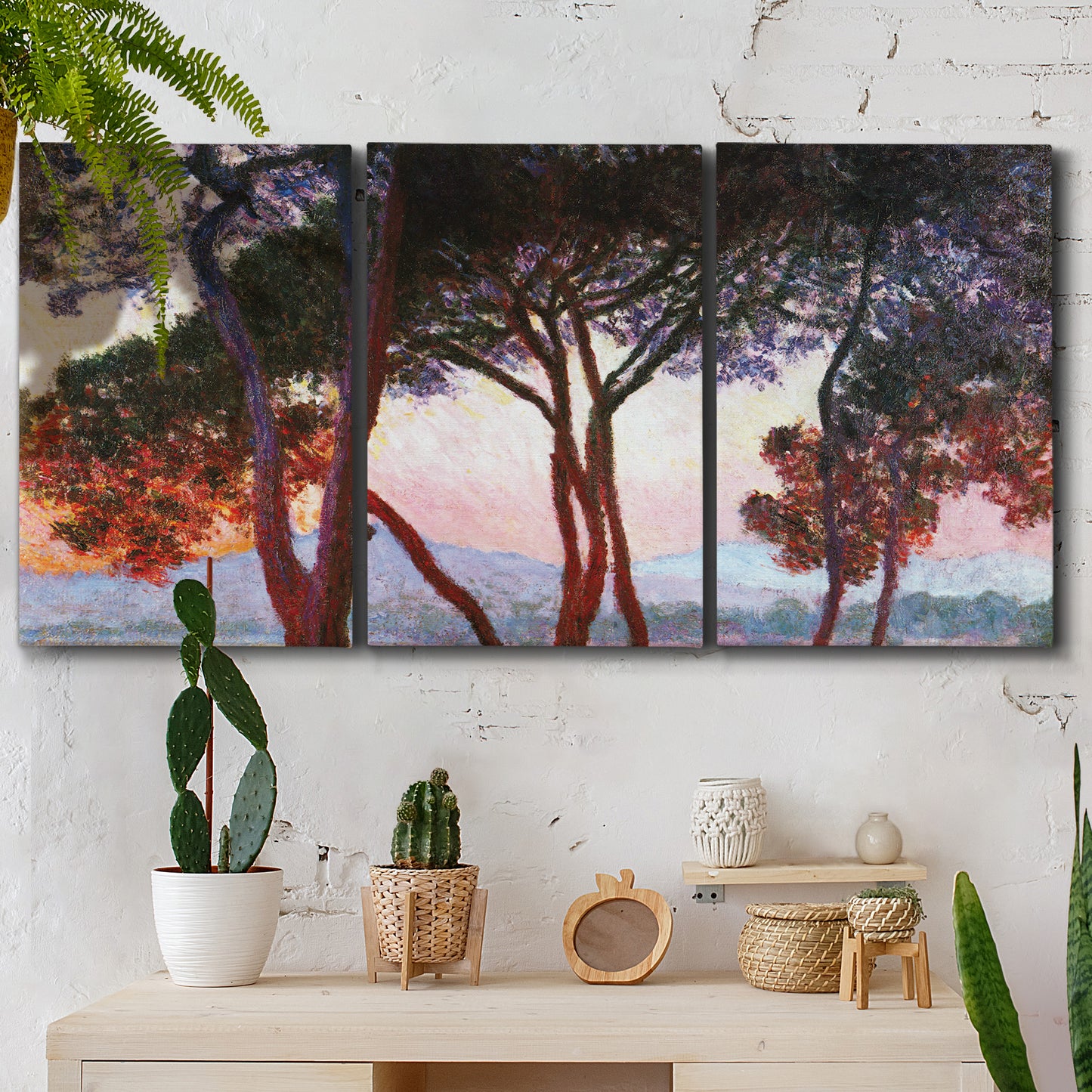 Three-panel canvas wall art featuring sunlit pines along mediterranean coast, displayed in a boho-chic entryway above a console table.