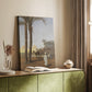 Canvas art print of a distant view of pyramids with figures in a sandy setting styled in a home decor setting.