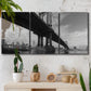 Three-panel canvas wall art featuring manhattan bridge industrial cityscape, displayed in a boho-chic entryway above a console table.