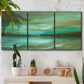 Three-panel canvas wall art featuring hidden coastal cove landscape, displayed in a boho-chic entryway above a console table.