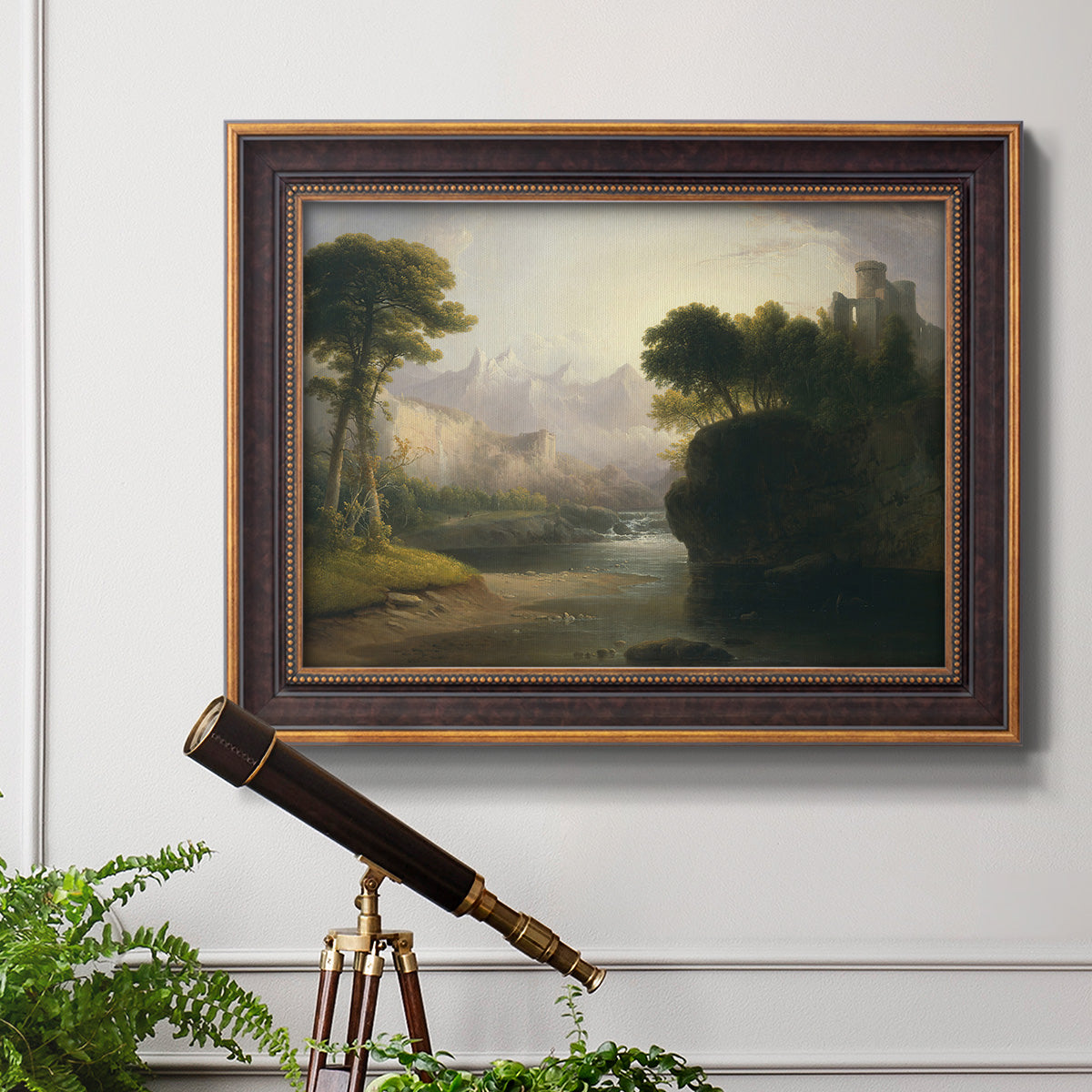 Romantic autumn landscape along the Hudson River by Thomas Doughty in an ornate bronzed mahogany wood frame displayed in a light-toned interior setting.