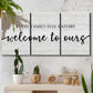 Three-panel canvas wall art featuring tropical beach at sunset photograph, displayed in a boho-chic entryway above a console table.