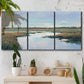Three-panel canvas wall art featuring coastal plain meeting open water, displayed in a boho-chic entryway above a console table.