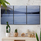 Three-panel canvas wall art featuring calm blue water landscape, displayed in a boho-chic entryway above a console table.