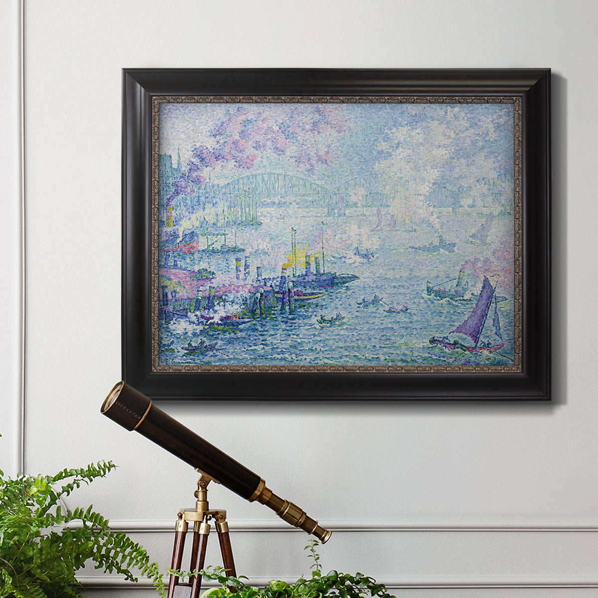 Impressionist industrial harbor scene by Paul Signac in an ornate black frame with gilded inner detail displayed in a light-toned interior setting.