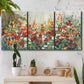 Three-panel canvas wall art featuring colorful garden flowers in bloom, displayed in a boho-chic entryway above a console table.