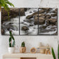 Three-panel canvas wall art featuring rushing river water over rocks, displayed in a boho-chic entryway above a console table.