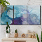 Three-panel canvas wall art featuring icy abstract crystalline forms, displayed in a boho-chic entryway above a console table.