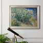 Impressionist lilac flower painting by Vincent van Gogh in an ornate champagne frame displayed in a light-toned interior setting.