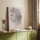 Canvas art print of a refined portrait study with smooth lines and gentle tones styled in a home decor setting.