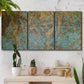 Three-panel canvas wall art featuring earthy copper toned abstract, displayed in a boho-chic entryway above a console table.
