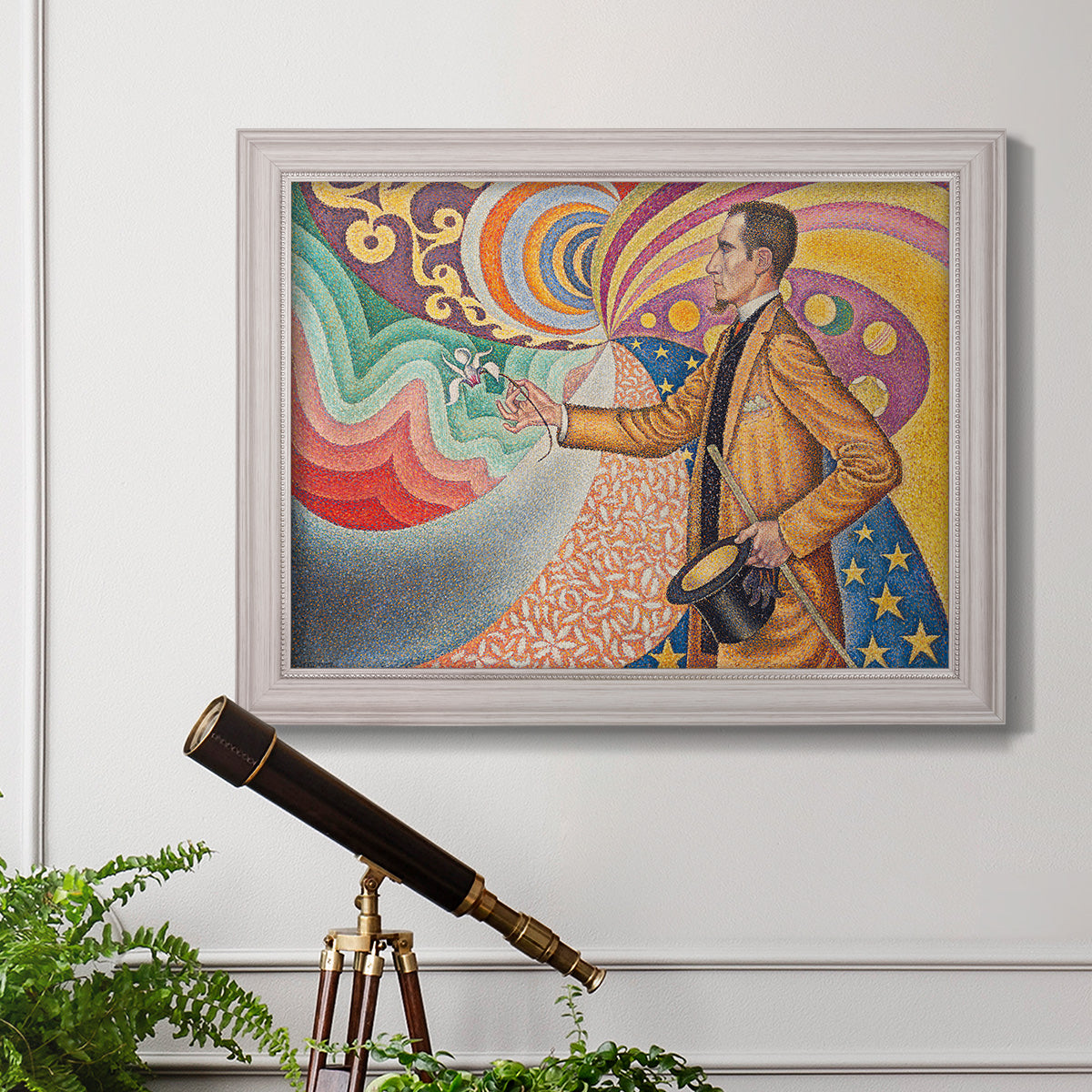 Neo-impressionist abstract portrait by Paul Signac in an ornate weathered white frame displayed in a light-toned interior setting.