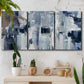 Three-panel canvas wall art featuring soft abstract mountain color fields, displayed in a boho-chic entryway above a console table.