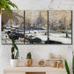 Three-panel canvas wall art featuring snowy village road in winter, displayed in a boho-chic entryway above a console table.