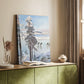 Canvas art print of a peaceful winter landscape with skaters on ice beside a forest shoreline styled in a home decor setting.