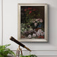 Early impressionist floral painting by Claude Monet in an ornate champagne frame displayed in a light-toned interior setting.