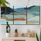 Three-panel canvas wall art featuring vibrant abstract with dramatic motion, displayed in a boho-chic entryway above a console table.