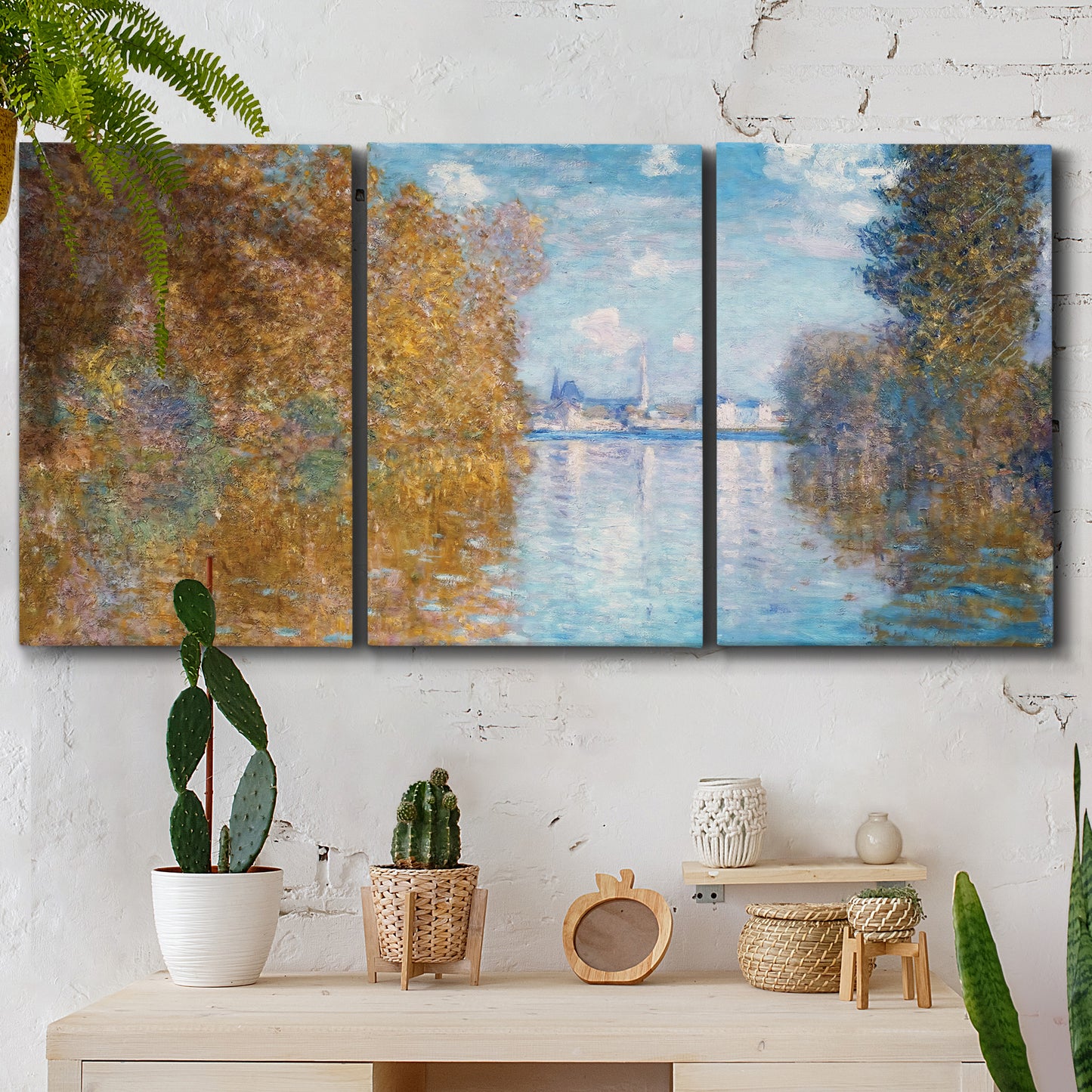 Three-panel canvas wall art featuring autumn landscape with glowing foliage, displayed in a boho-chic entryway above a console table.