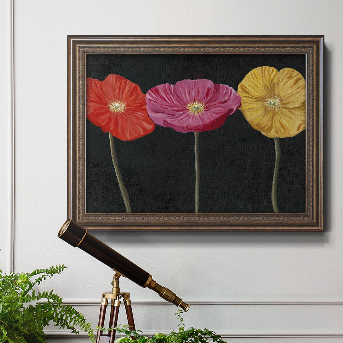 Contemporary poppy flower artwork in an ornate traditional bronze frame displayed in a light-toned interior setting.
