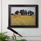 Impressionist rural harvest scene by John Singer Sargent in an ornate black frame with gilded inner detail displayed in a light-toned interior setting.
