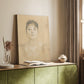 Canvas art print of a refined female head with minimal detail and gentle tones styled in a home decor setting.