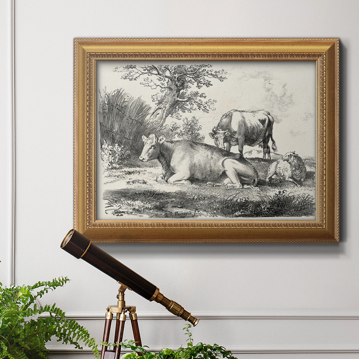 Classical pastoral landscape artwork by Nicolas Berchem in an ornate antique gold frame displayed in a light-toned interior setting.