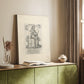 Canvas art print of a classical figure with fine etched detail and structured pose styled in a home decor setting.