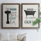 Set of two walnut barnwood framed canvas prints depicting black tubs, hand-lettered phrases, and small teal accents arranged across two complementary compositions above a sofa in a bright living space.
