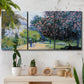 Three-panel canvas wall art featuring formal city park with trees, displayed in a boho-chic entryway above a console table.
