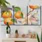 Three-panel canvas wall art featuring bright tangerine still life blossoms, displayed in a boho-chic entryway above a console table.
