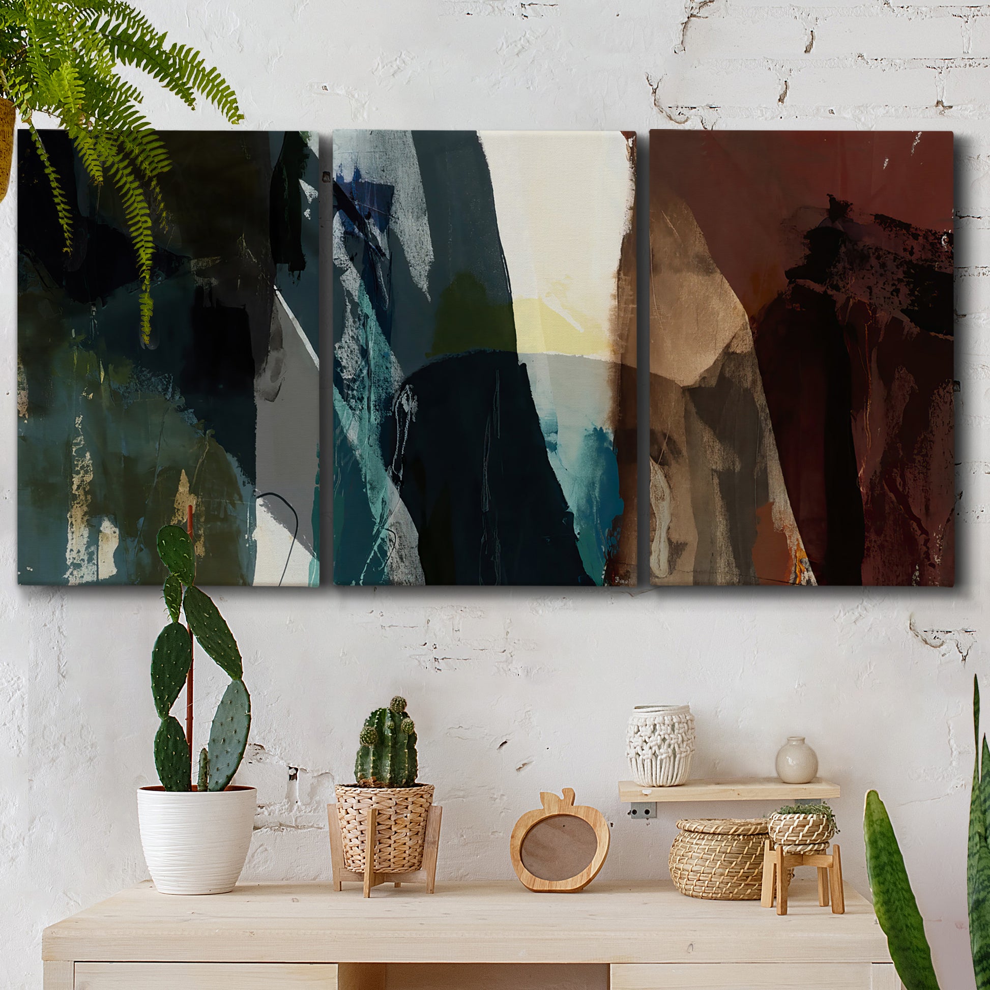 Three-panel canvas wall art featuring layered neutral abstract textures, displayed in a boho-chic entryway above a console table.