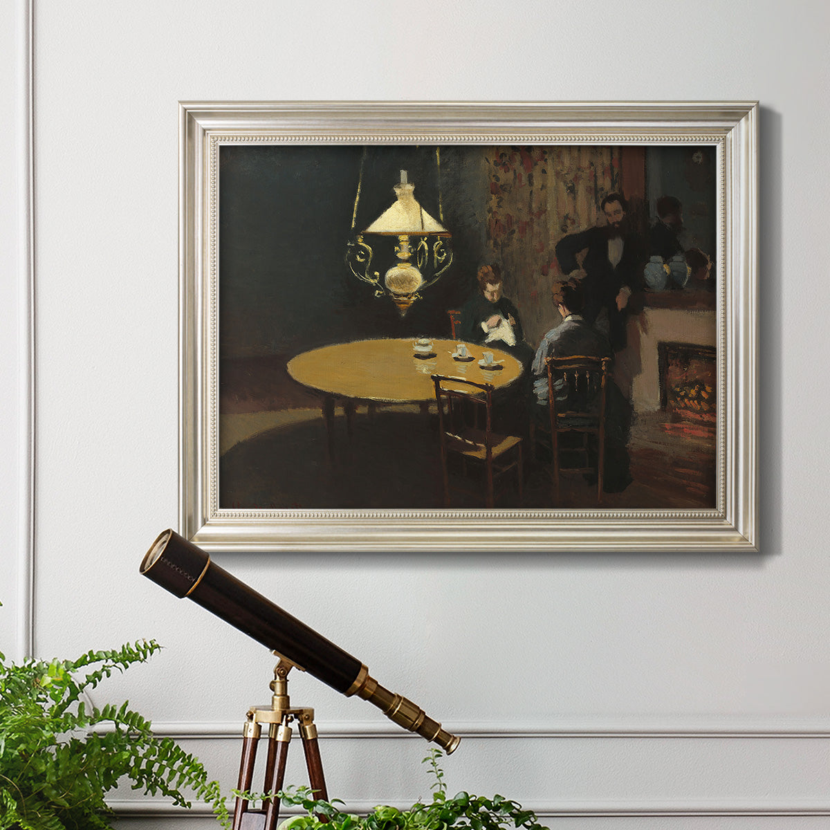 Impressionist domestic interior scene by Claude Monet in an ornate champagne frame displayed in a light-toned interior setting.